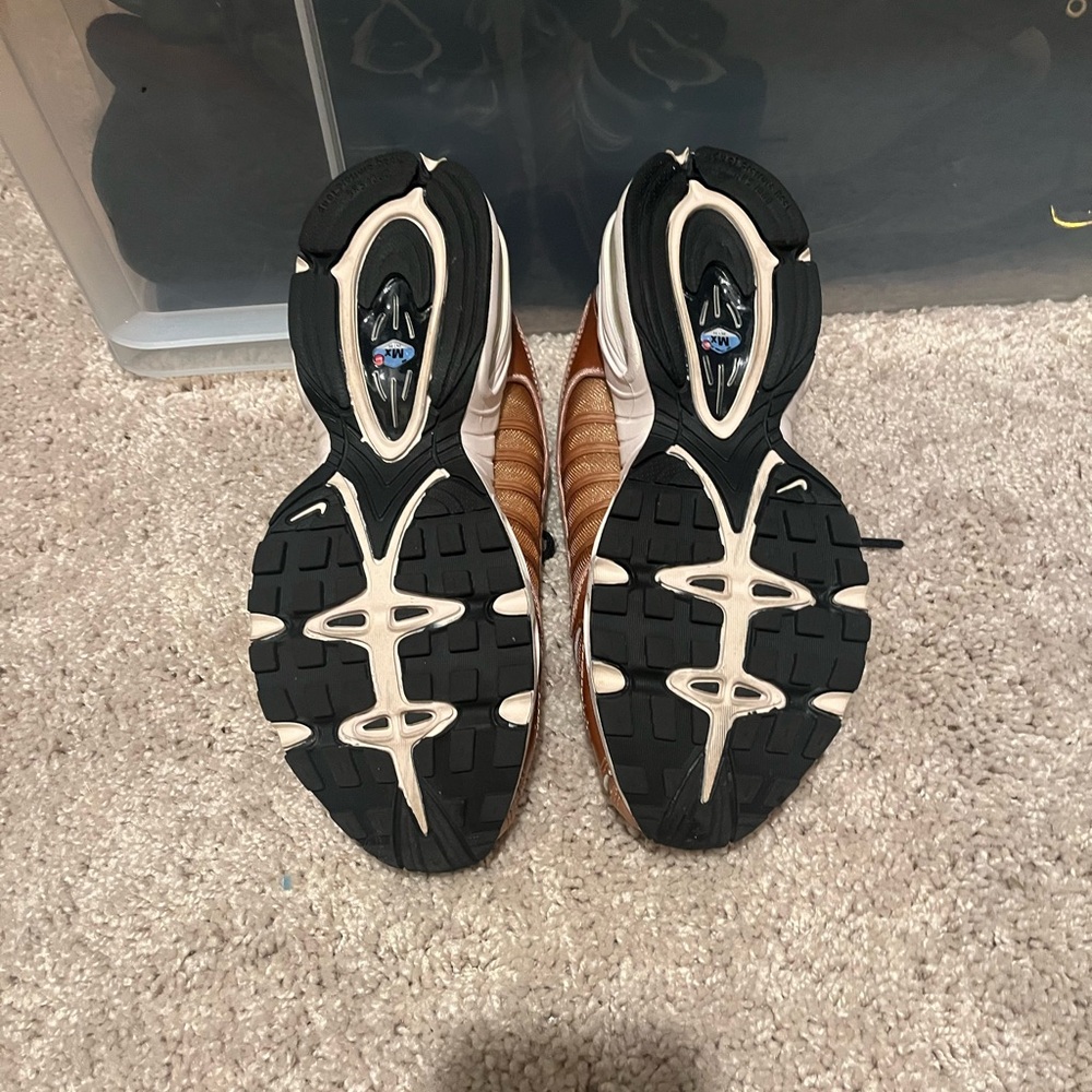 Nike Black and Rose Gold Athletic Shoes Modern Design limited edition